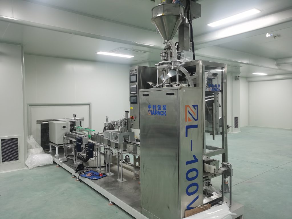 машина для вакуумної упаковки порошку